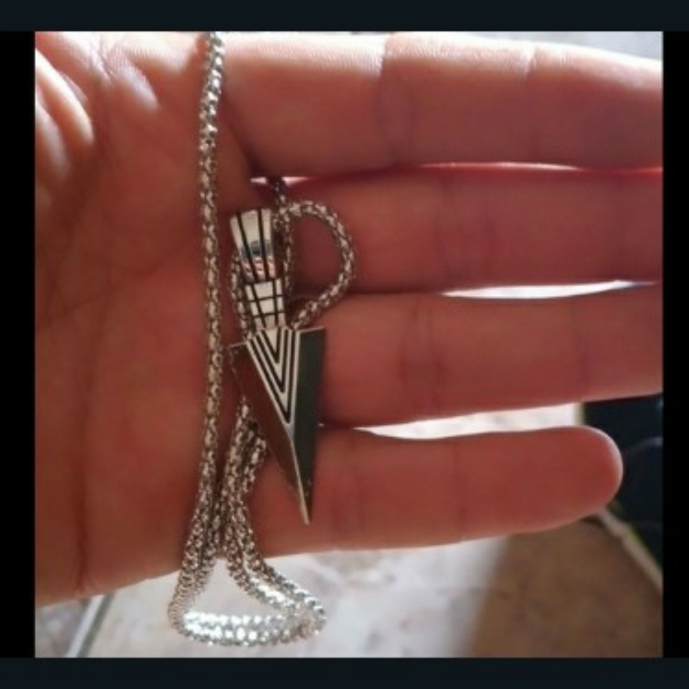 Gold, Black, and Silver Jewelry Head Pendant